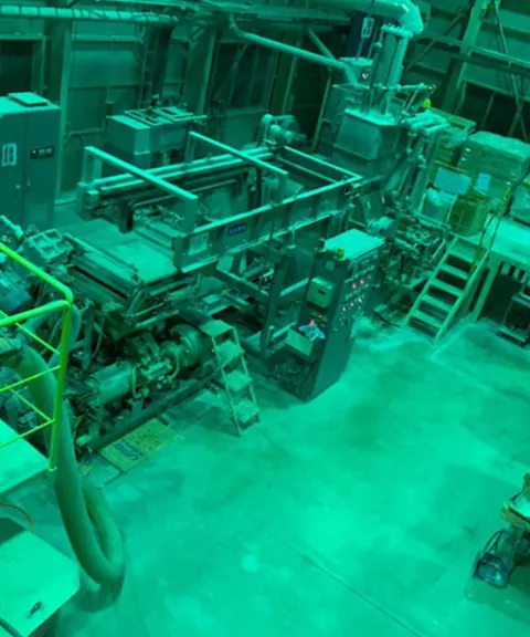 Machinery on a processing plant floor.