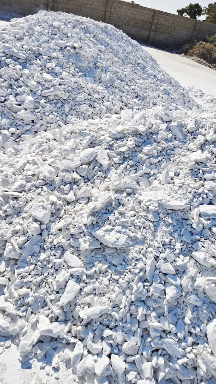 Heap of crushed white talc lumps.